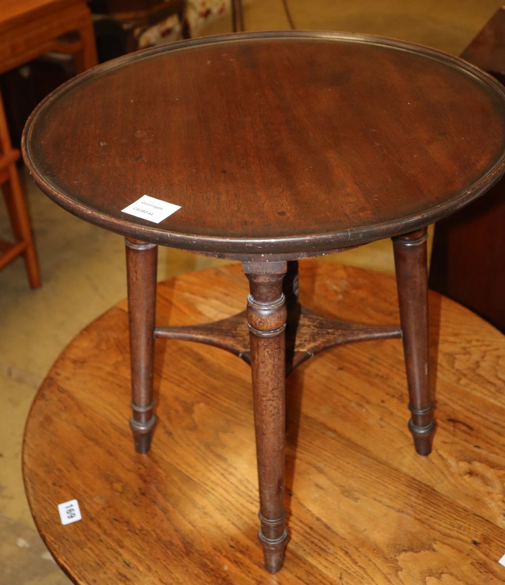 A George IV mahogany adjustable stool, with later circular dished top, 50cm diameter, H.48cm